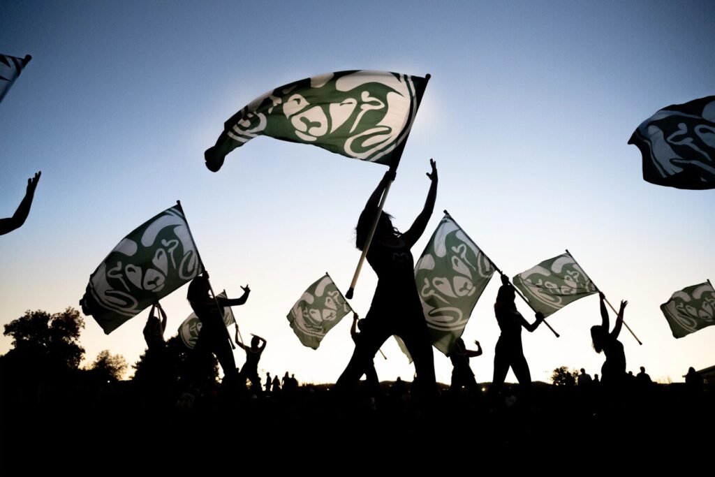 Students With CSU Flags at Homecoming